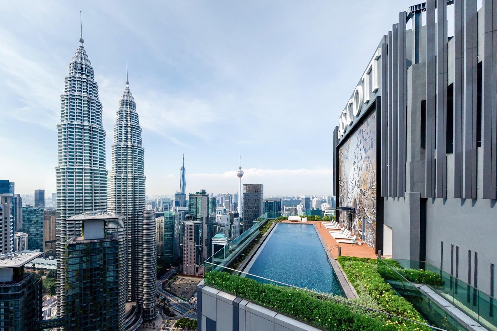 Ascott Star Residence sky park lap pool with the Petronas Twin Towers behind