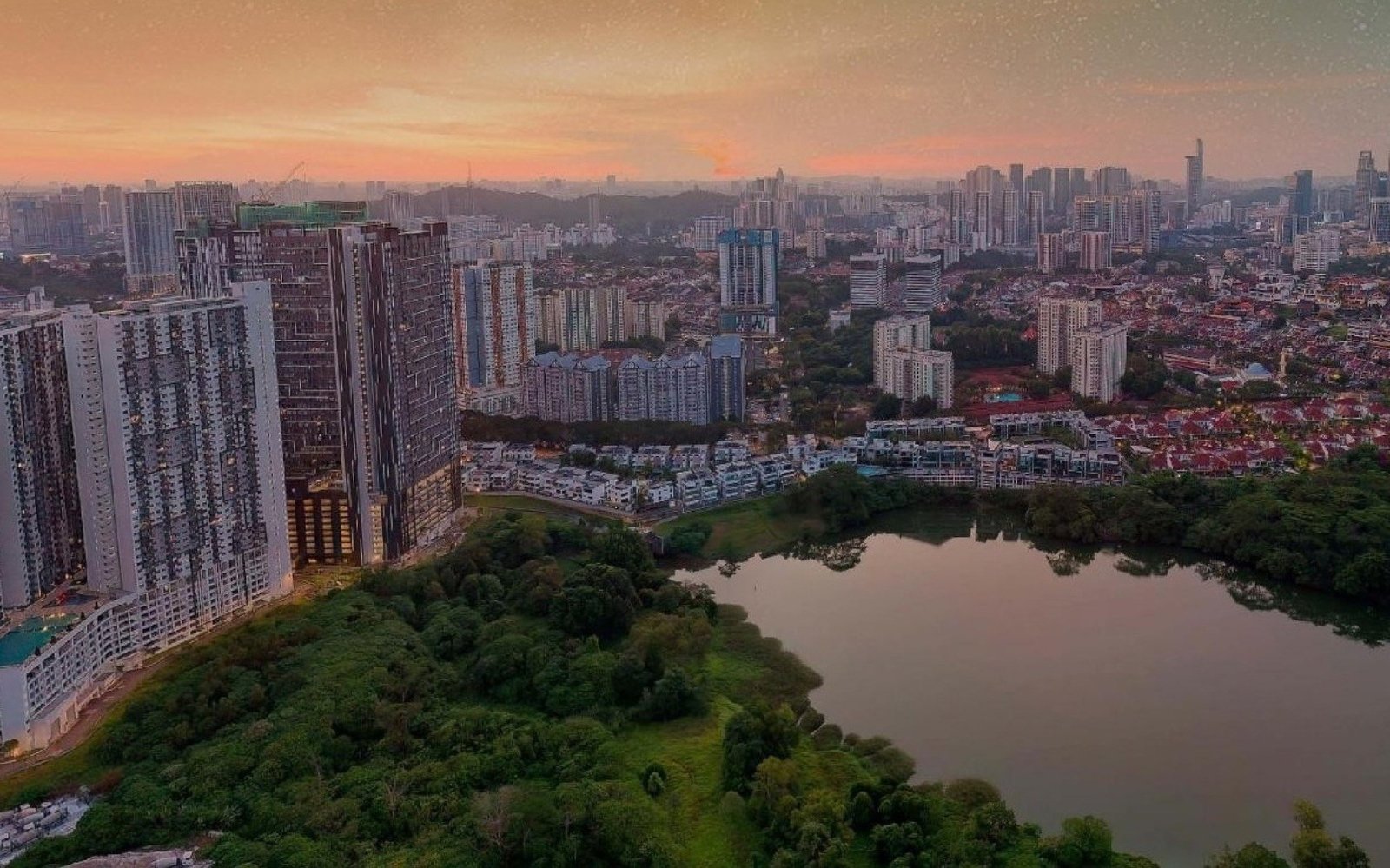 Aerial view over a lake and the surrounding neighbourhood: illustrative image