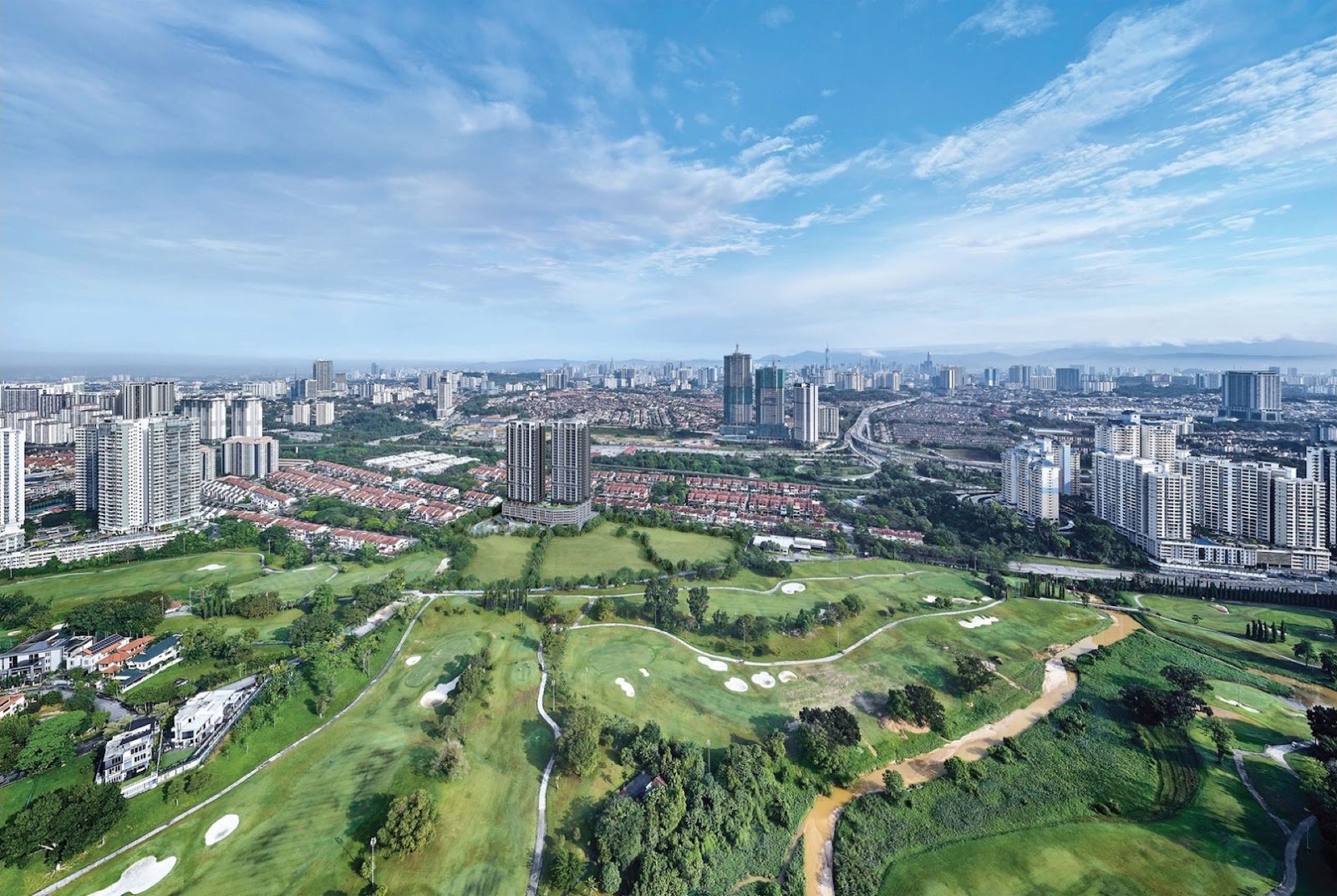 Aerial view over the golf course and Bukit Jalil towards the city