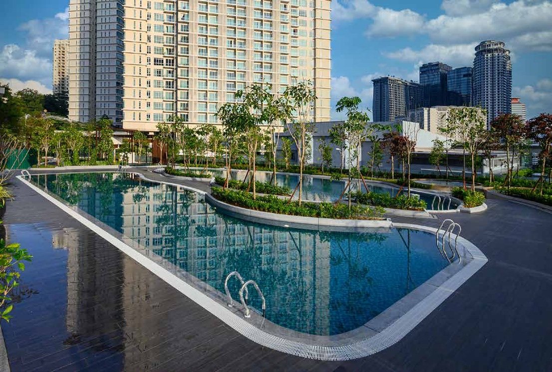 The Goodwood Residence pool deck with the tower behind